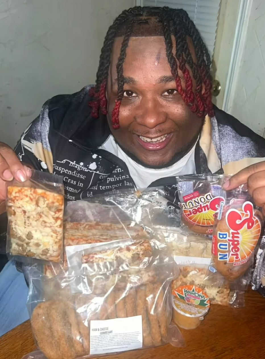 School Daze customer holding food